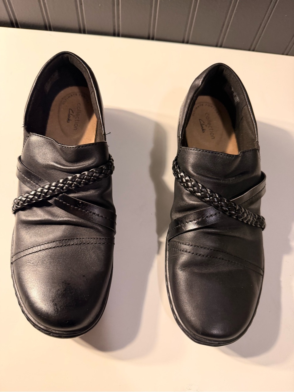 Clarks women's  Black Slip-On Leather Shoes with Braided Detail